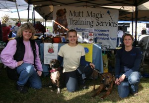 IMG_4370 Bonnie, Aja, and Amber at the Mutt Magic booth.